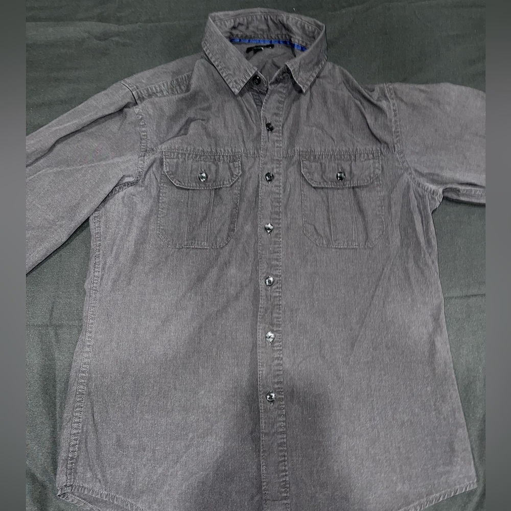 A small button down gray shirt